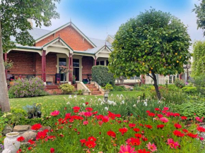 Gold and Grapes Garden Suites